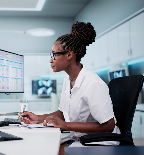 Women looking at computer at hospital